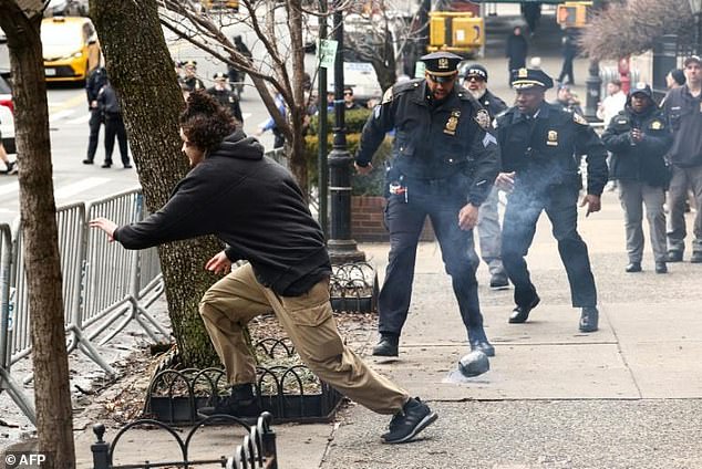 NYPD Chief's Daring Leap During Protest Goes Viral as Symbol of Heroism