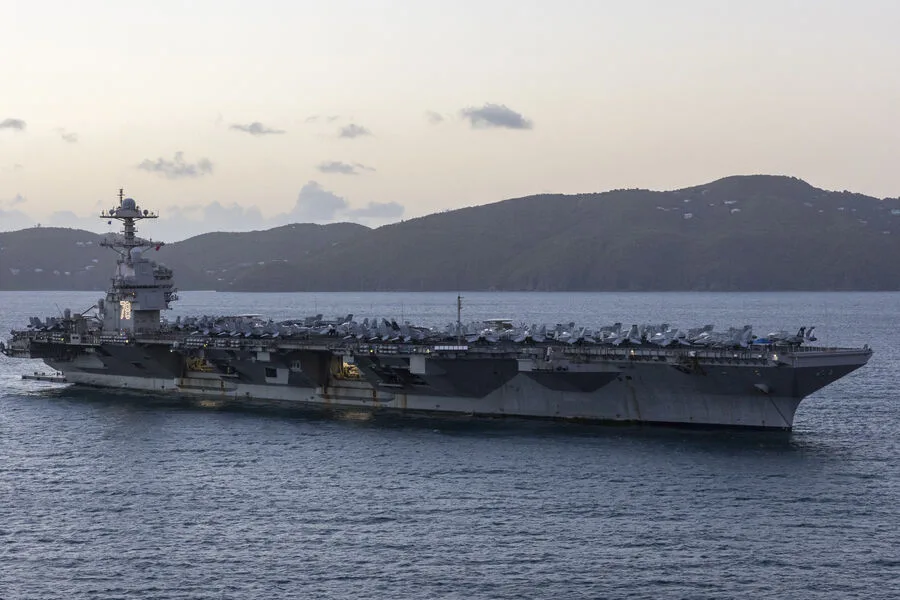 Iran Warns U.S. Carrier in Red Sea Poses Existential Threat, Declares Support Facilities as Targets