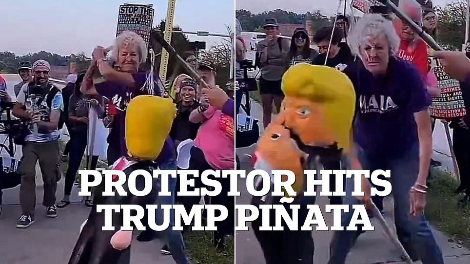 Protester strikes piñata of Trump while wearing 'Make America Kind Again' shirt