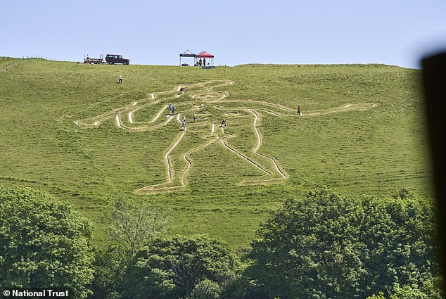 Workers Re-chalk Historic Cerne Abbas Giant to Preserve Icon for Future