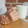 Elderly Woman's Unexplained Hand Tremor Sparks Concern and Medical Inquiry