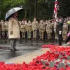 Royal Resilience in the Rain: King and Queen Honor Kirkcaldy's Centenary