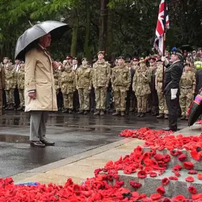 Royal Resilience in the Rain: King and Queen Honor Kirkcaldy's Centenary