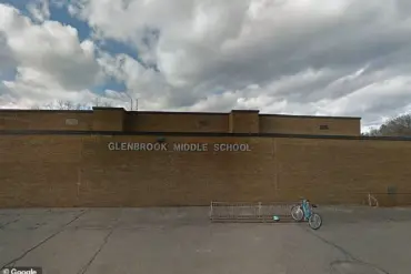 Arrest of School Librarian Sparks Scrutiny of Employee Vetting Regulations