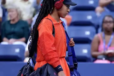 Naomi Osaka Steals the Spotlight at US Open with Dazzling Red Ensemble and Bedazzled Labubu Charm